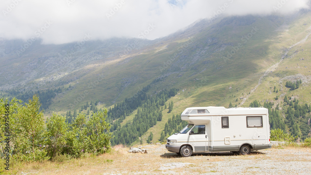 Camper van parked high in the mountains Camper van parked high in the mountains