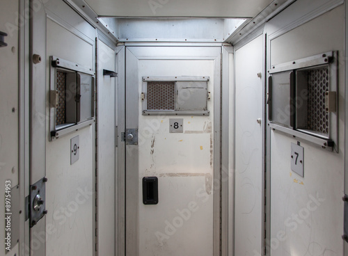 Inside of a large bus used by police photo