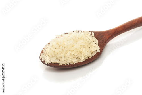 Rice,White rice in wooden spoon isolated