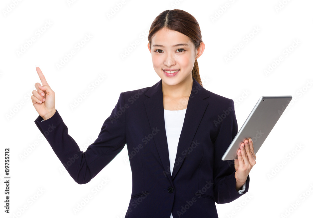 Asian young businesswoman hold with tablet pc and finger point u Asian young businesswoman hold with tablet pc and finger point u