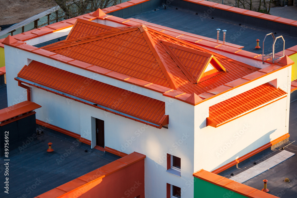 Fototapeta premium Beautiful small house with orange roof