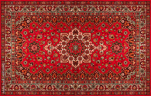Old Persian carpet with pattern. top view photo