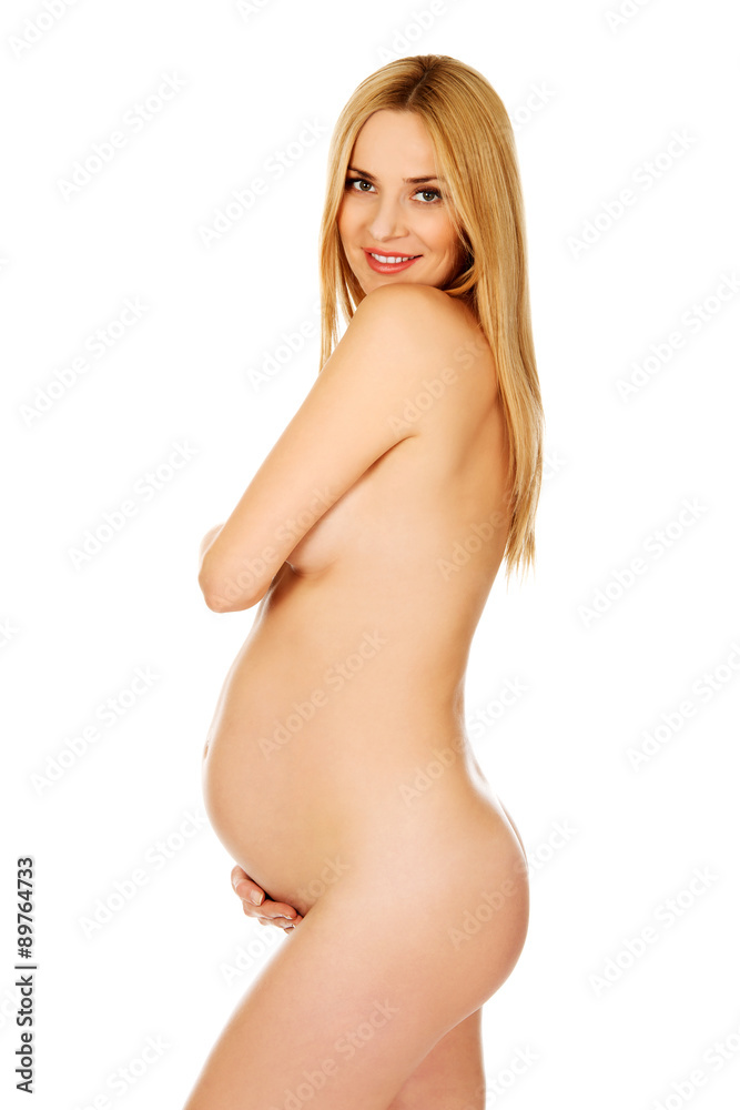 Fototapeta premium Pregnant woman covering her breast
