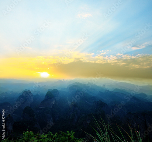 mountains with sunrise background.