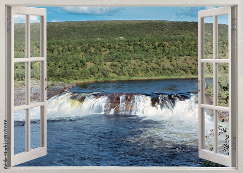 Open window view to wide waterfall and river