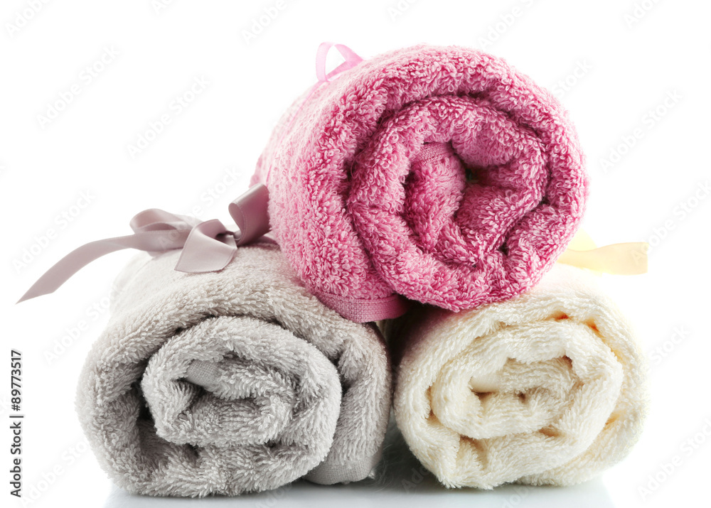 Rolled up colorful towels isolated on white Rolled up colorful towels isolated on white