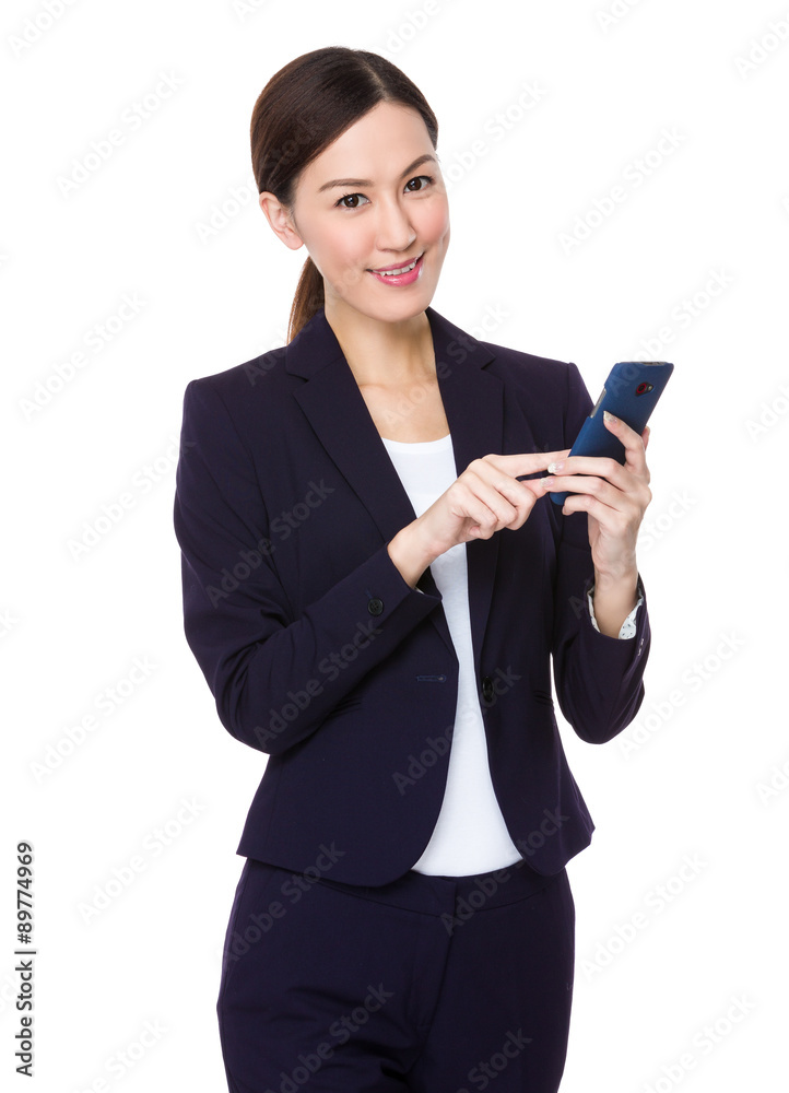 Young businesswoman use of the cellphone Young businesswoman use of the cellphone