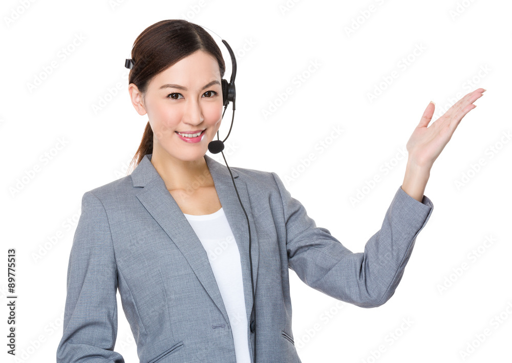 Customer services executive with open hand palm Customer services executive with open hand palm