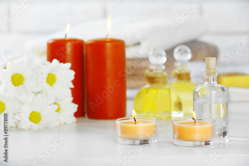 Composition of spa treatment on table, on white background