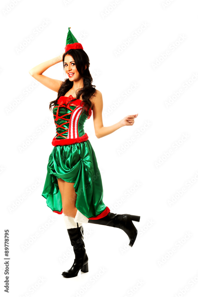 Woman in elf clothes pointing to the right