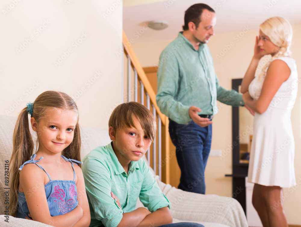 Children in silence while parents arguing