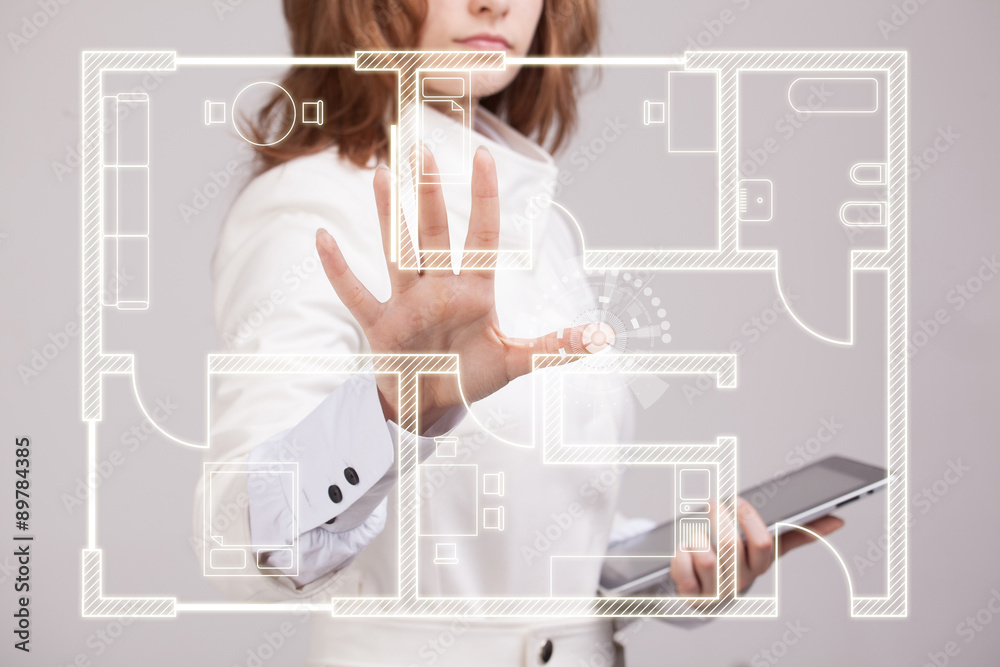 female architect working with a virtual apartment plan female architect working with a virtual apartment plan