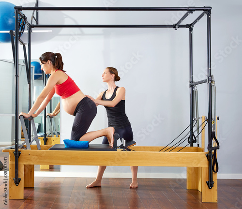 pregnant woman pilates reformer cadillac exercise