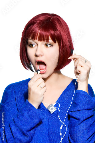 red-haired woman expression - hello to headphones