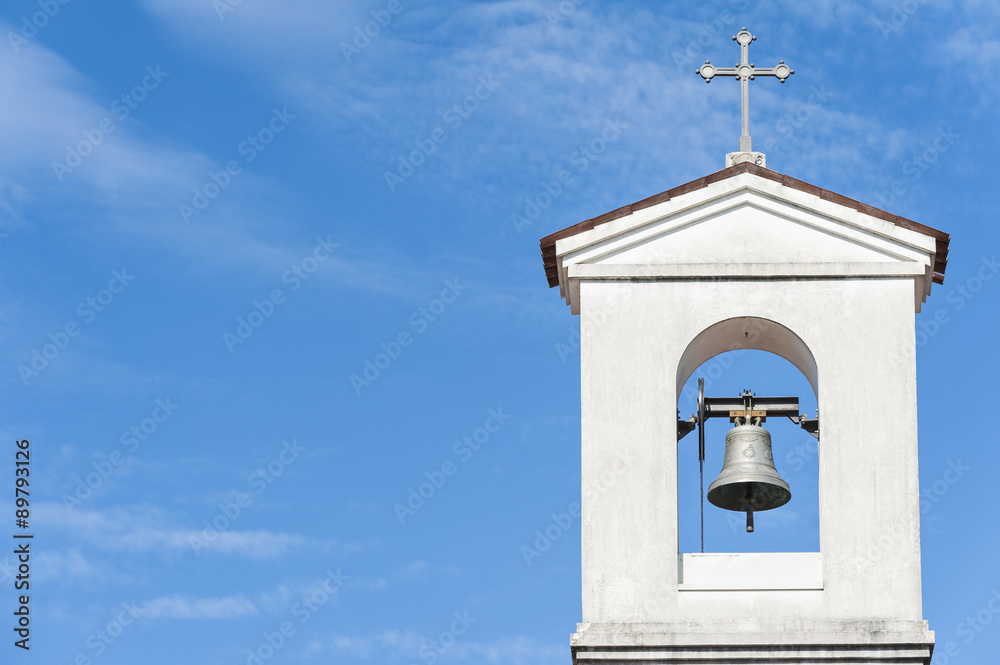 Small bell tower with a bell of a country church Small bell tower with a bell of a country church