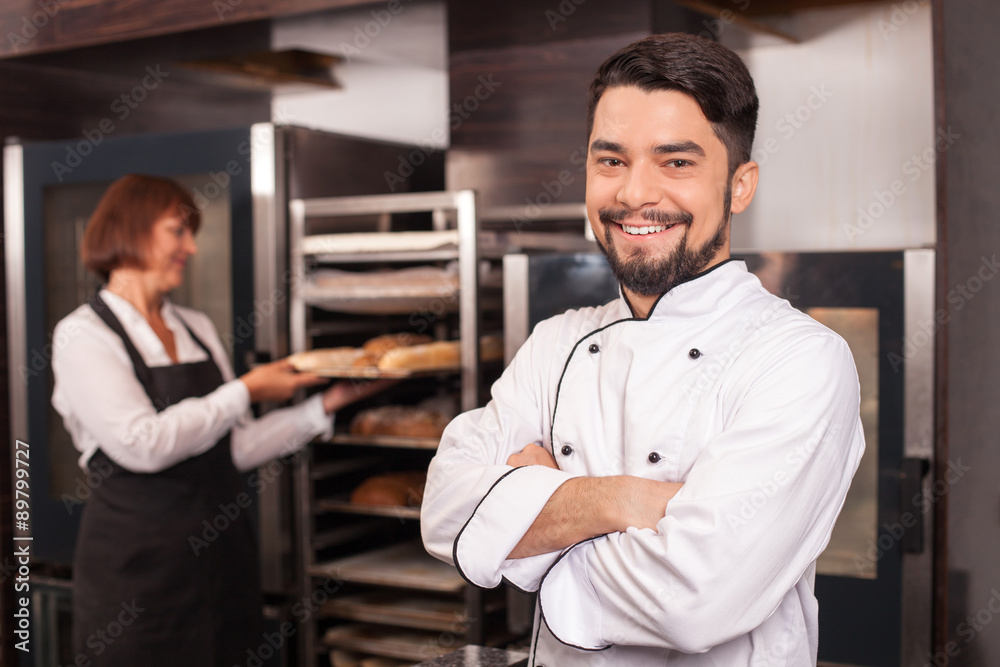 Cheerful chefs are in process of work Cheerful chefs are in process of work