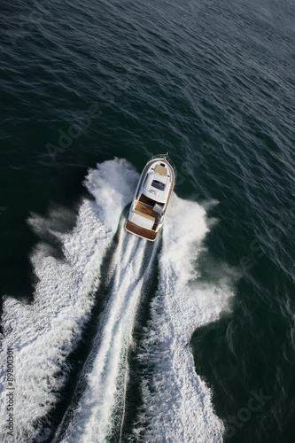 Yacht driving fast in the ocean © Image Supply Co