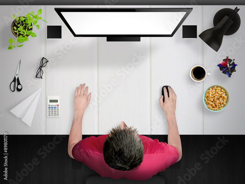 Guy working. Creative desk mock up scene with devices from top.