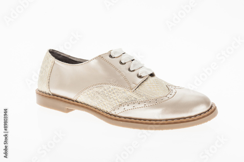  shoe made of pink beige with laces for women on white background