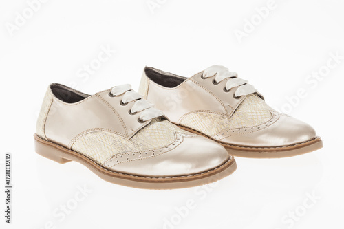  shoe made of pink beige with laces for women on white background