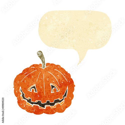 cartoon grinning pumpkin with speech bubble