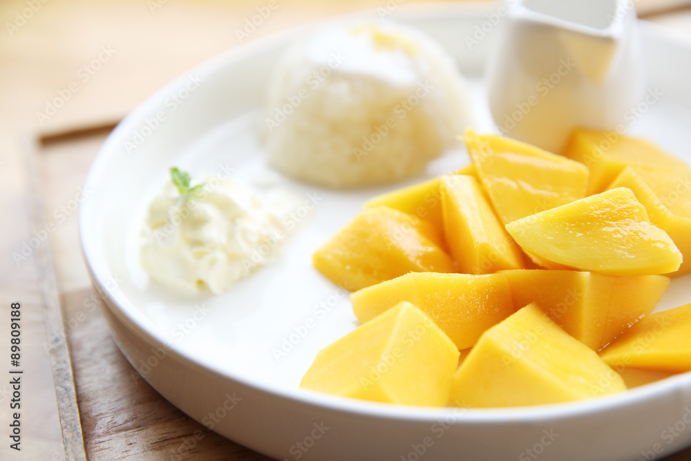 Sticky Rice with Mango on wood background Sticky Rice with Mango on wood background