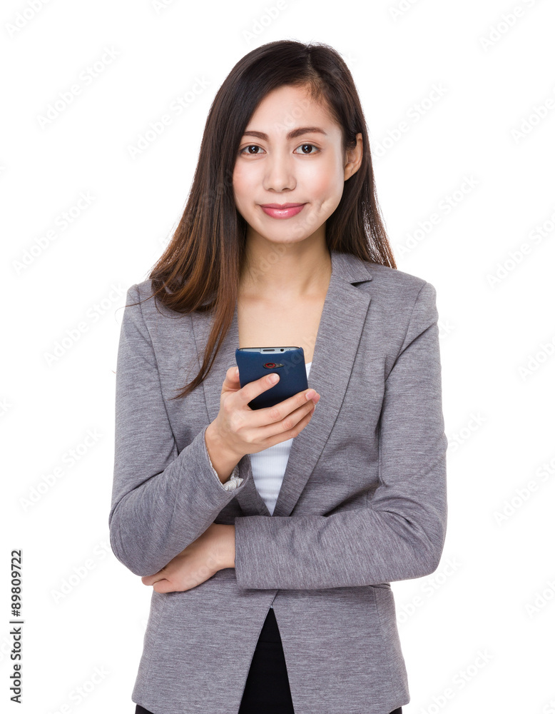 Asian young businesswoman use of the mobile phone Asian young businesswoman use of the mobile phone