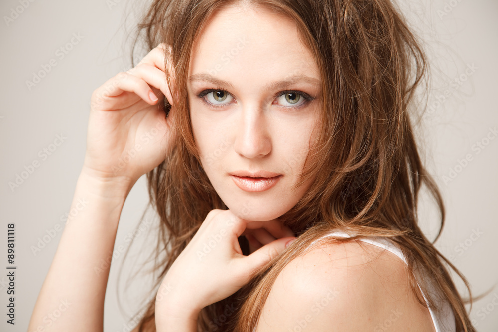Fototapeta premium Young beautilul woman close-up