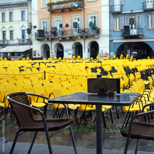 Foto View of the Locarno square with a lot of yellow chairs for the Locarno Film Fest