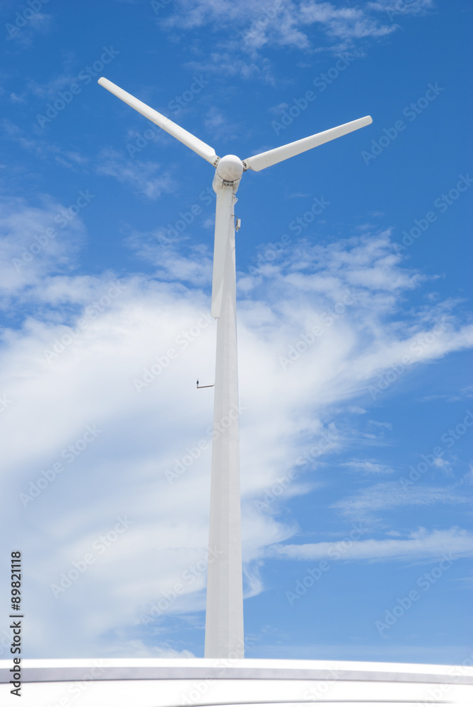 Wind Turbine generating electricity on blue sky Wind Turbine generating electricity on blue sky