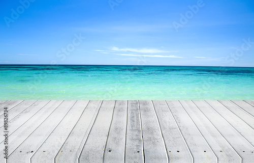 White Wooden Floor with Blue Sea for Background Texture