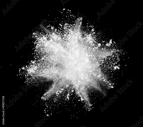 White powder on black background photo