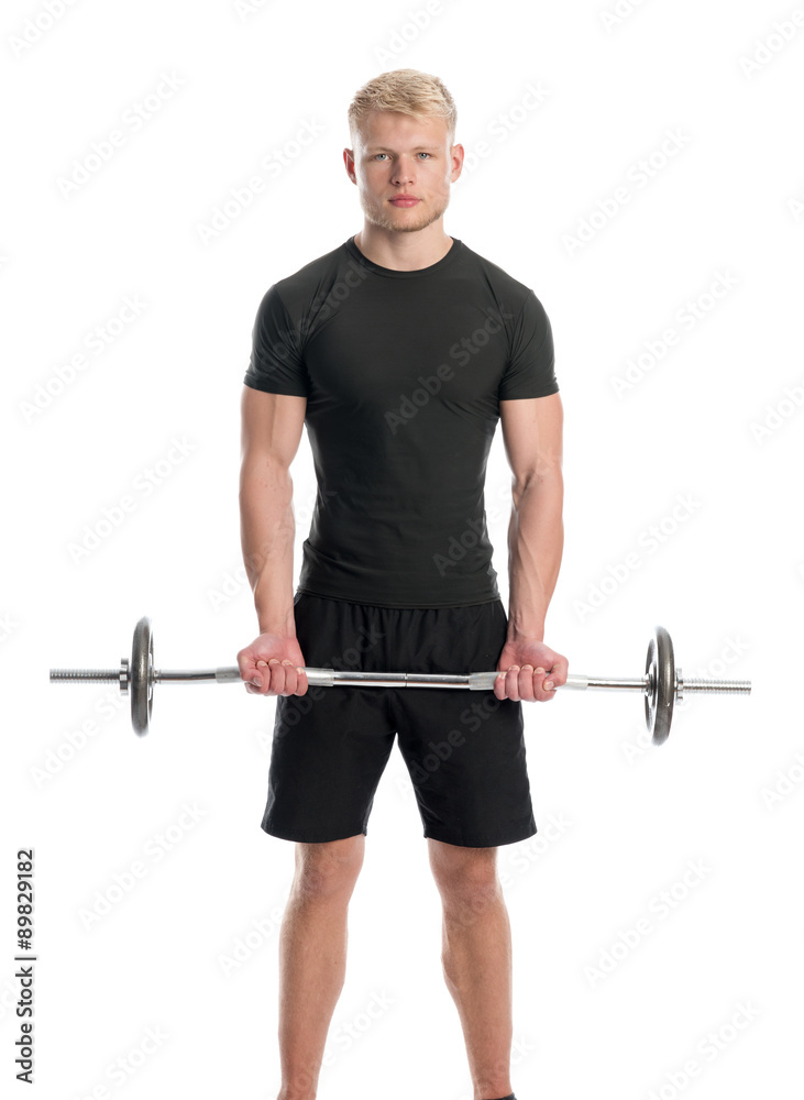Junger Mann beim Hanteltraining Junger Mann beim Hanteltraining