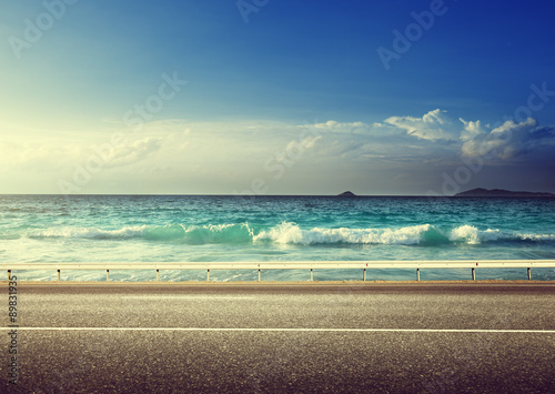 road on tropical beach photo