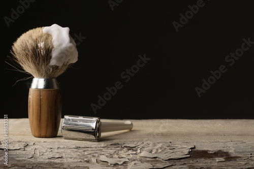 vintage shaving Equipment on wooden Table photo