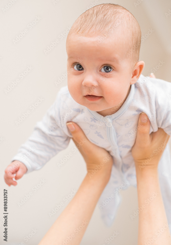 Mother playing with cute little baby. Mother playing with cute little baby.