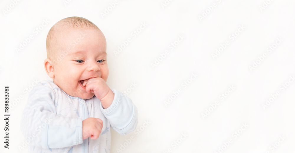 Smiling cute little baby. Place for your text. Smiling cute little baby. Place for your text.