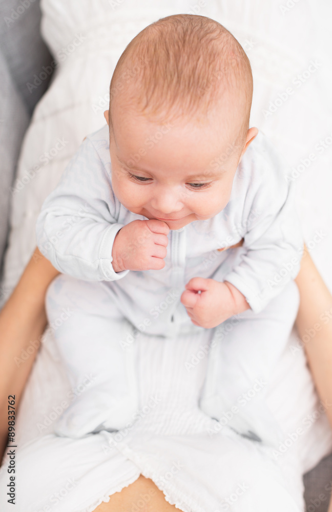Mother playing with cute little baby. Mother playing with cute little baby.
