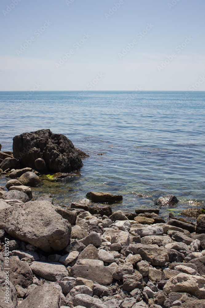 The coastline of the Black Sea with views of the mountains The coastline of the Black Sea with views of the mountains