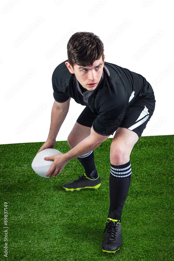 Rugby player about to throw the rugby ball