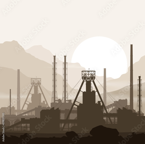 Mineral fertilizers plant over sunset in mountains