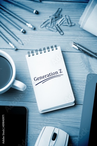 Generation z against notepad on desk