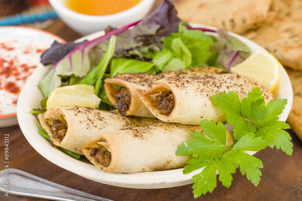 Briouat - Middle Eastern pastries filled with spicy lamb.
Briouat - Middle Eastern pastries filled with spicy lamb.