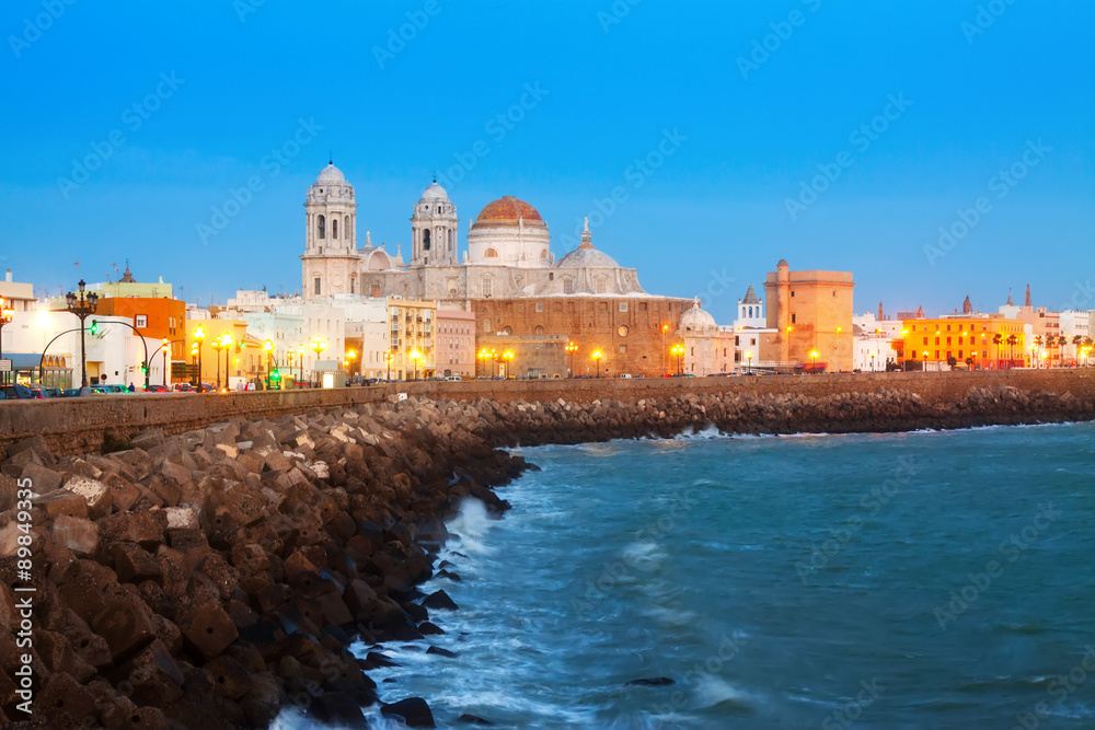 Evening view of  Cathedral and  ocean coast in Cadiz