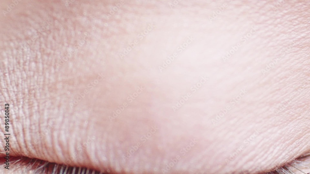 Macro Close-up eye blinking. Slow Motion, 120 fps, Zoom. Young Woman is opening and closing her beautiful eye. Macro Close-up eye blinking. Slow Motion, 120 fps, Zoom. Young Woman is opening and closing her beautiful eye.