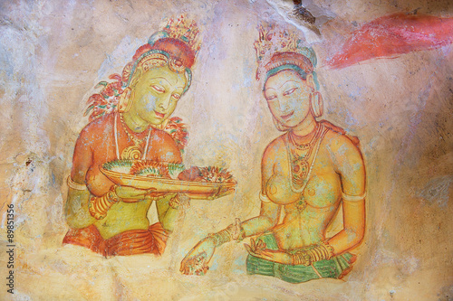 Exterior of the 5th century fresco wall paintings of Sigiriya rock fortress in Sigiriya, Sri Lanka. Sigiriya is a UNESCO World Heritage Site.