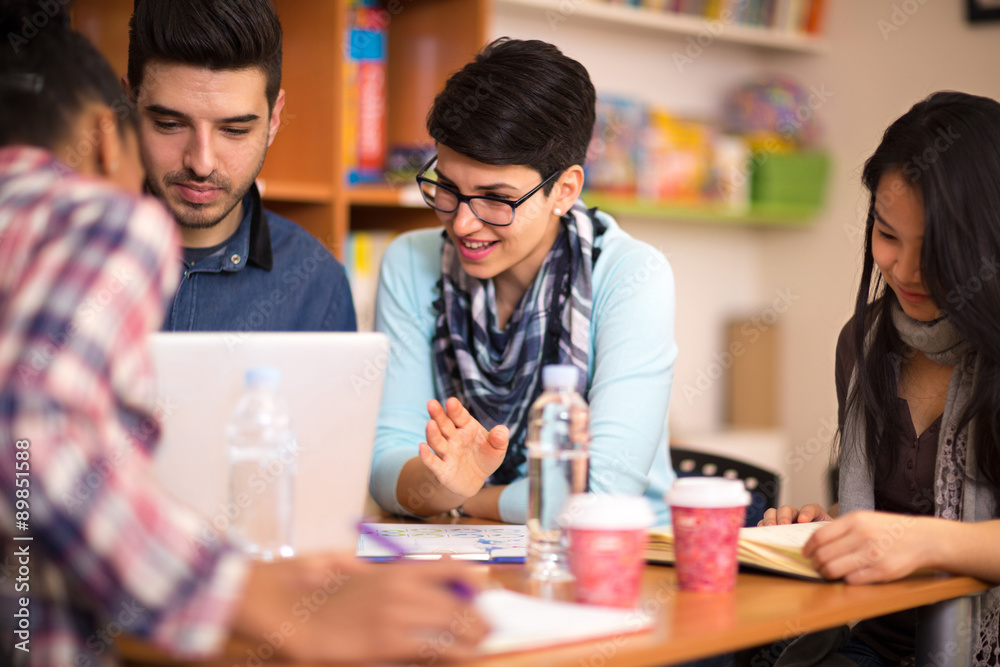 Classmates studying together for exam