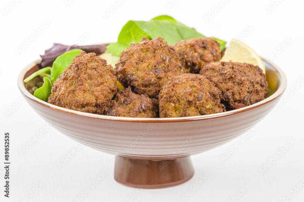 Falafel - Middle Eastern deep fried balls made of chickpeas.
Falafel - Middle Eastern deep fried balls made of chickpeas.