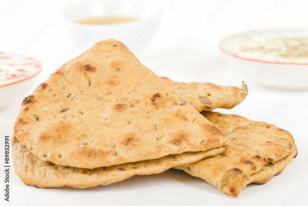 Flatbread - Middle Eastern multi seeded flatbread with mixed dips. Flatbread - Middle Eastern multi seeded flatbread with mixed dips.