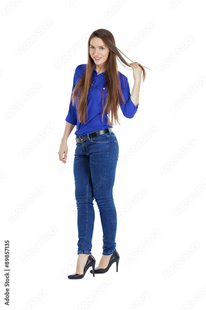 Portrait of a beautiful woman in blue jeans and blue shirt Portrait of a beautiful woman in blue jeans and blue shirt